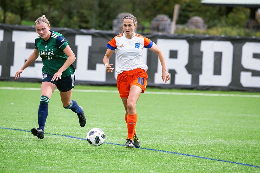 Alyssa Nikkel on the attack against the Nippising Lakers at Vaso’s Field.