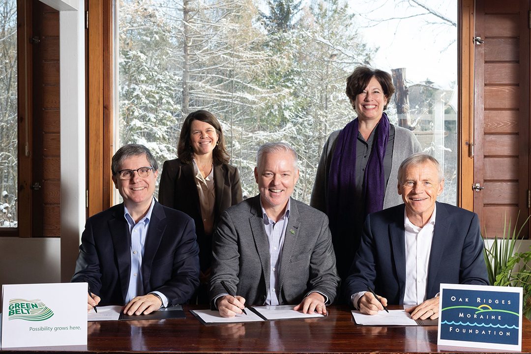 The first is of the signing event where Oak Ridges Moraine Foundation formally integrated with Greenbelt Foundation. From left to right, the photo shows: David McKeown (Board Chair, Greenbelt Foundation), Shelley Petrie (Program Director, Greenbelt Foundation), Edward McDonnell (CEO, Greenbelt Foundation), Caroline Schultz (Executive Director, Ontario Nature and former Board Chair, Oak Ridges Moraine Foundation), Robert Messervey (Board Member, Greenbelt Foundation and Interim Board Chair, Oak Ridges Moraine Foundation)