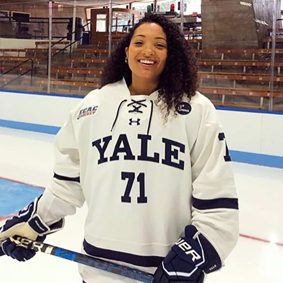 Saroya Tinker playing hockey at Yale.