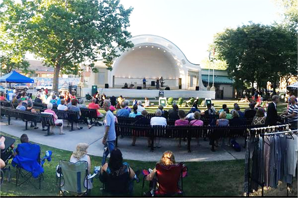 A crowd enjoying an outdoor concert at Oshawa Memorial Park's outdoor concert venue in July 2019.