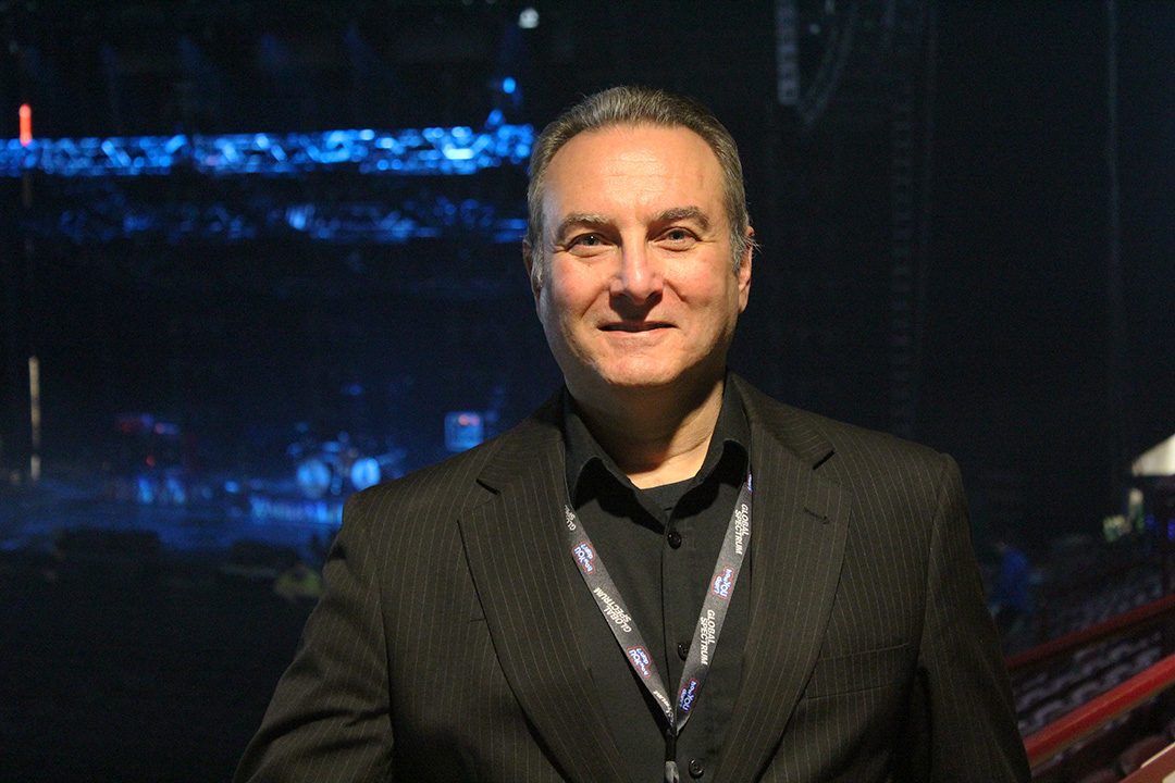 Vince Vella, General Manager of Tribute Communities Center, posing before a live event