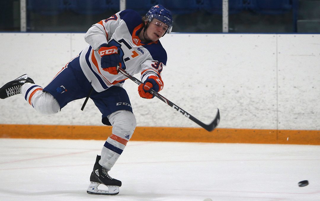 Forward Cameron Hough shooting on goal.