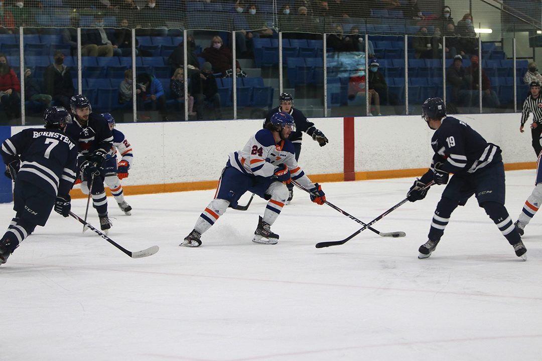 Forward Cullen McLean finding space through defenders.