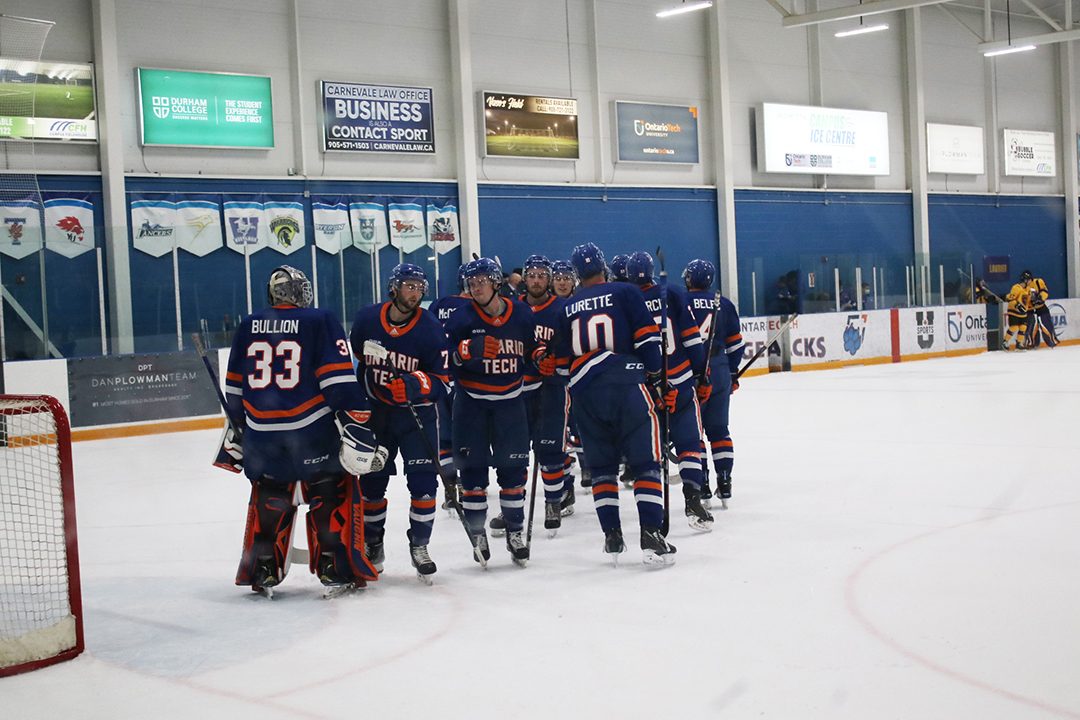 OTU celebrating its win against Laurier.