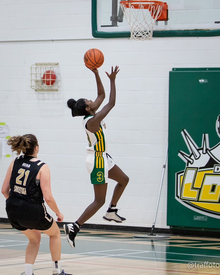 Brianna Morrison playing basketball