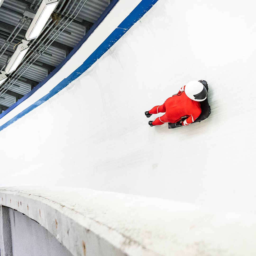 Shannon Galea speeds down a skeleton track.