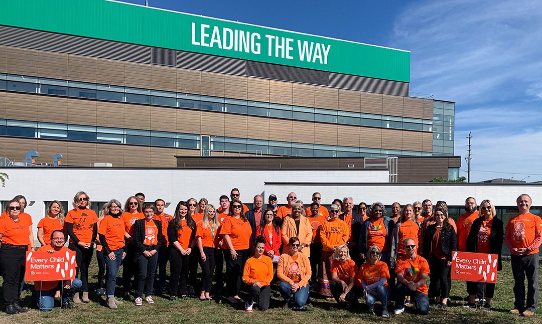 People show their orange shirts at Durham College for the second National Day for Truth and Reconciliation.