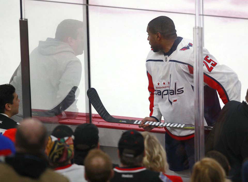 Devante Smith-Pelly talking back to a fan in Chicago, who racially abused him, in 2018.