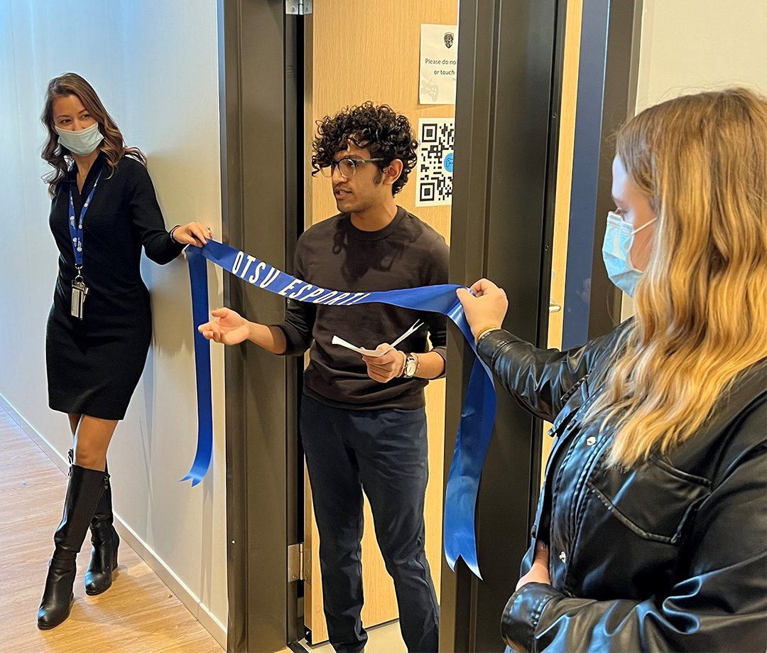 OTSU president Josh Sankarlal cutting the ribbon prior to the unveiling of the new arena.