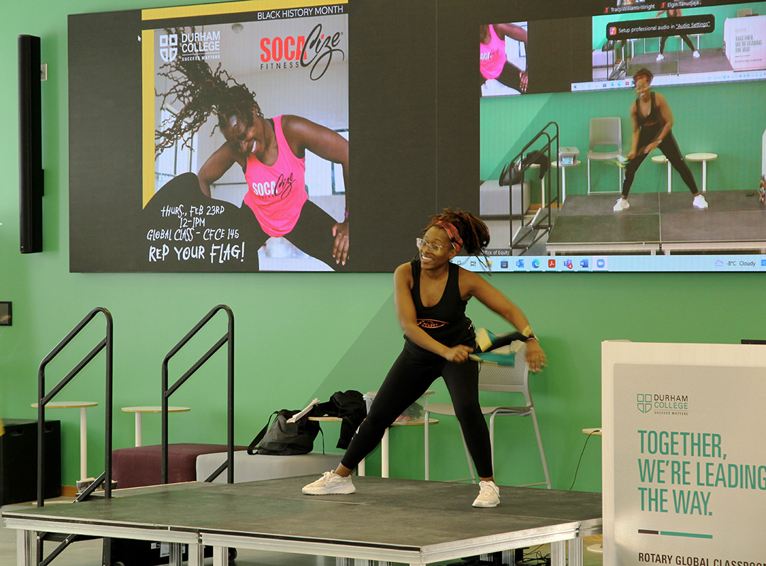 Jennifer Shand instructing a socacize event at Durham College. This took place in the global classrom at the Centre for Collaborative Education (CFCE) building. The purpose of the even was to raise awareness for Black History Month. Photo Credit: Hafed Almadani