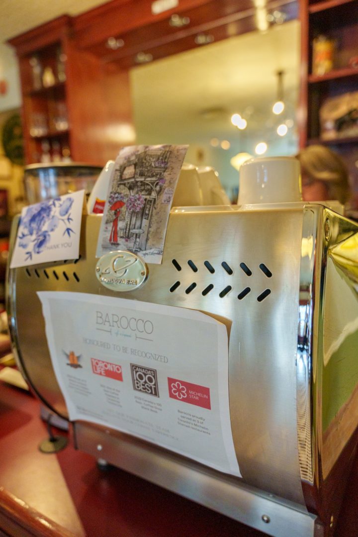 A small espresso machine sits on a counter under glowing yellow lights at Nice Bistro in Whitby, Ont.