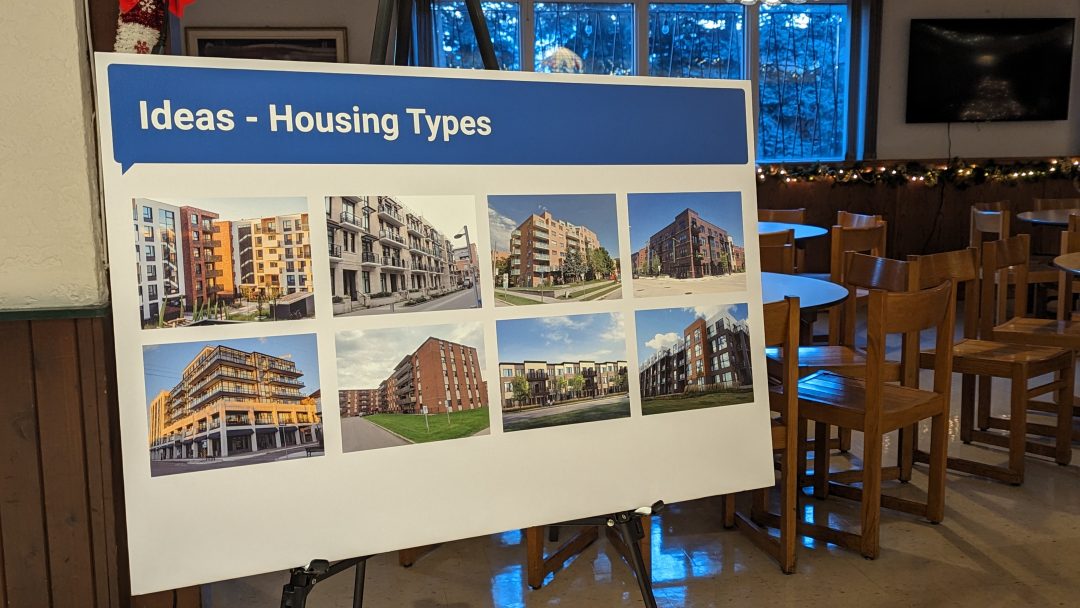 A board that says "Ideas - Housing Types"
And than shows eight renders of what the housing on Christine Cres. could look like. 

One thing in common with each building is they are all three or four stories tall or more.