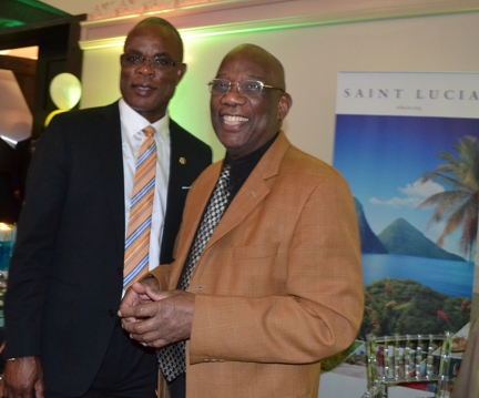Anthony Joseph poses with Saint Lucia Consul General Michael Willius at a 35th anniversary party for Saint Lucia Diaspora.