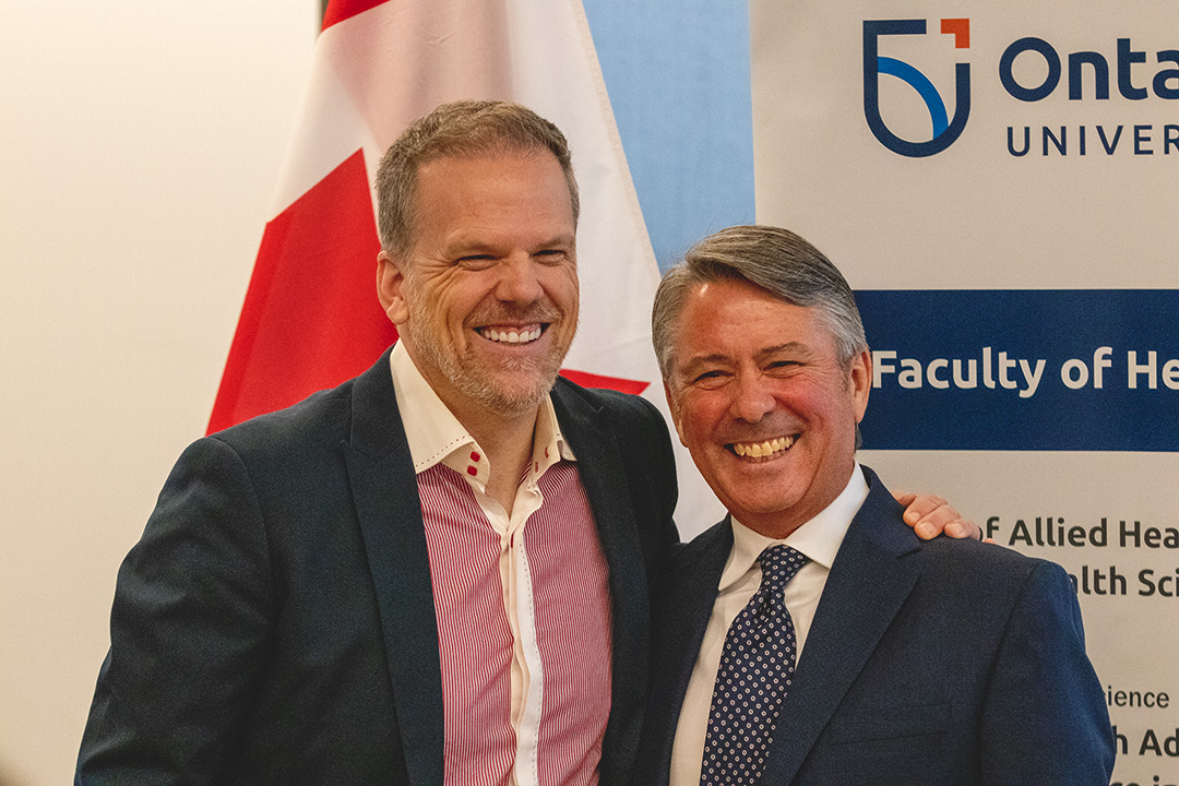 Minister Mark Holland (left) and Dr. Pierre Côté (right) at an event celebrating the new WHO Collaborating Centre at Ontario Tech University in Oshawa, Ont. on Nov. 22, 2024.