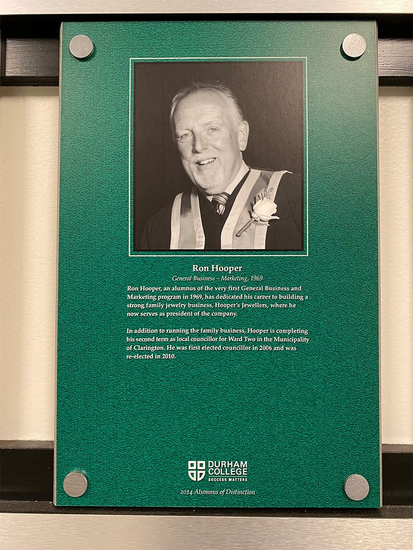 Alumnus of Disticncion Award plaque dedicated to Ron Hooper located on the Almni Wall of Distinction at the Oshawa campus, near the Campus Bookstore. Jack Conway/The Chronicle