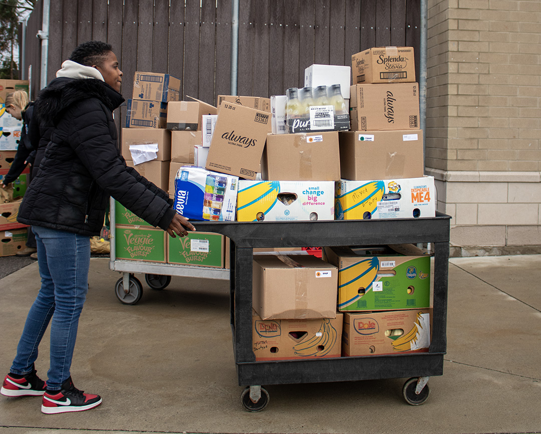 A Durham College Student Association (DCSA) volunteer was spotted in Oshawa, Ont., on Nov. 21, pushing a cart loaded with essential items into Durham College’s student centre. The items supplied by Feed the Need in Durham are for the college’s food bank to support students in need.