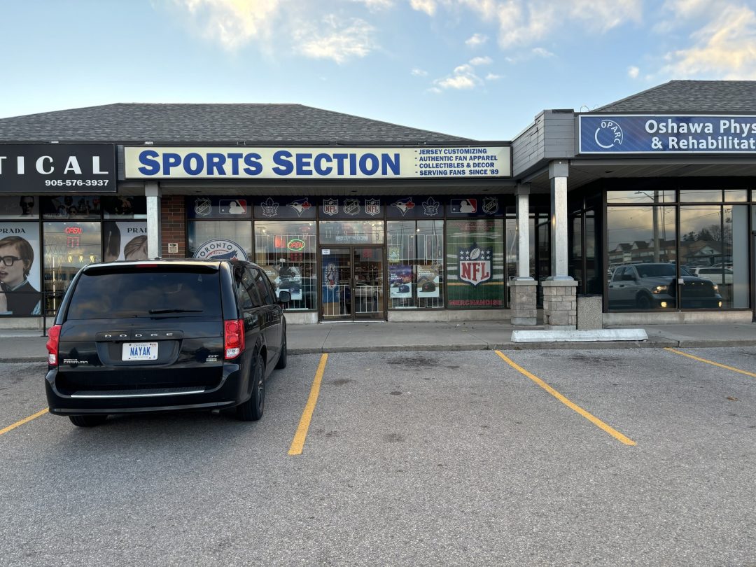 The outside of Sports Section, a sports memorabilia store.