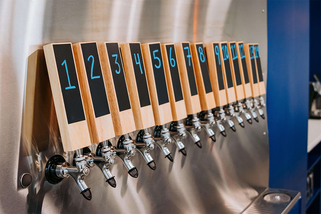 Beer taps at the Torchbearer Taproom in Oshawa, Ont. The taproom opened on Dec. 6, 2024 and showcases beers, ciders and wines from local brands. Torchbearer Taproom