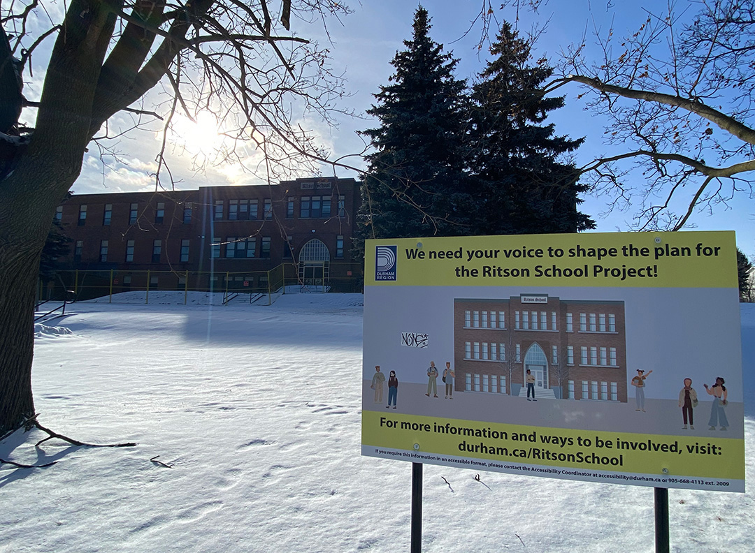 Boards providing information on the former Ritson Public School redevelopment in Oshawa, Ont., on Feb. 5, 2025. The Region of Durham purchased the school in 2022 with the intent of turning the site into affordable housing.