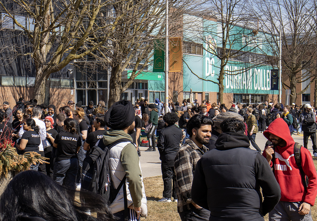 The front of the Gordon Willey building after students and staff evacuated following the false alarm.