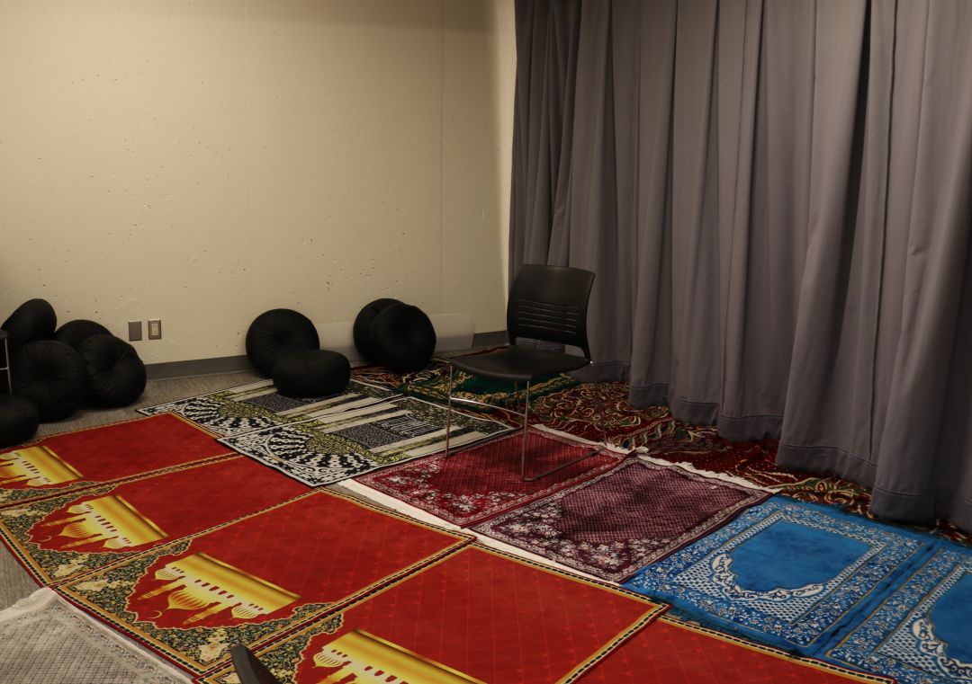 A variety of prayer mats and cushions are available, ensuring a comfortable environment for students practicing their faith.