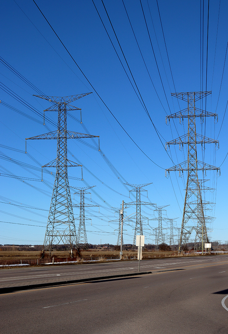 Transmission towers bring electricity to residents and businesses in Oshawa. Located along Winchester Rd. Photo taken on March 17, 2025.