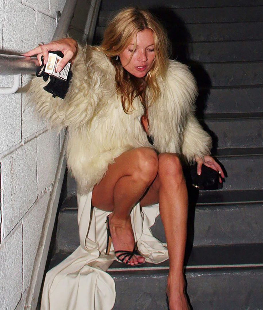 Kate Moss during a night out in 2007, wearing a fur coat.