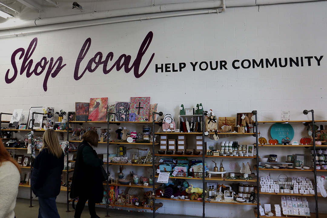 Community members explore locally made goods during a book lovers event in Bowmanville, Ont. on Nov. 8, 2025. The author’s event highlights the importance of supporting local creators and vendors.
