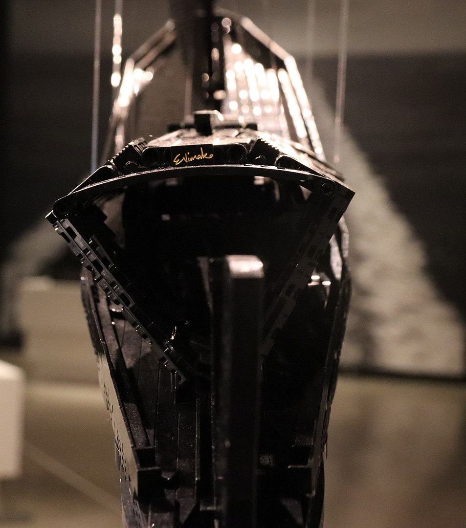 Robert McLaughlin Gallery showcases "Building Black Civilizations" by Ekow Nimako ,an exhibit made of black LEGO. One of his pieces show Nimako&squot;s signature on the back.