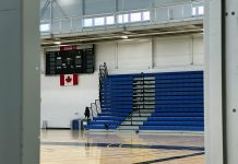 Police search for suspects after replica handgun found during high school basketball game