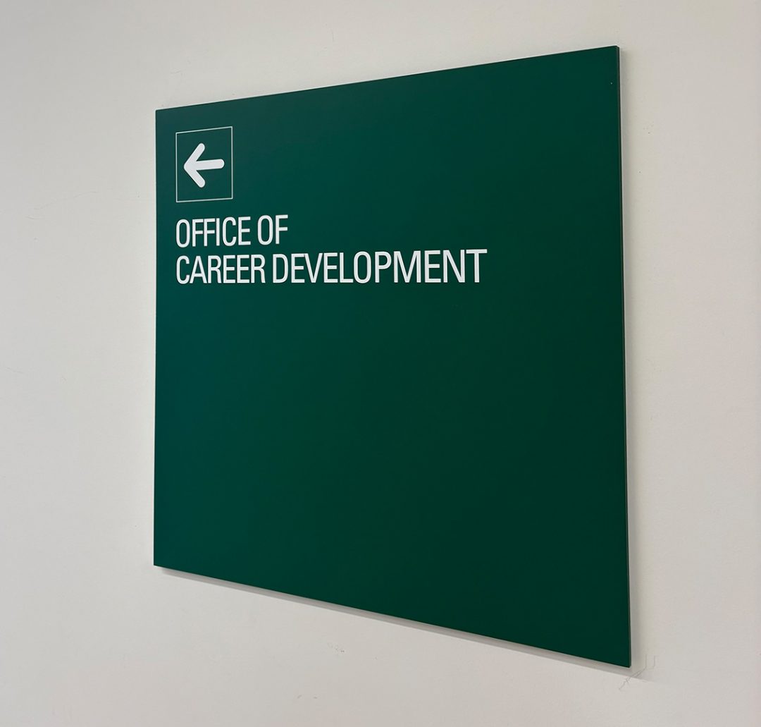 A green sign that says Office of Career Development.